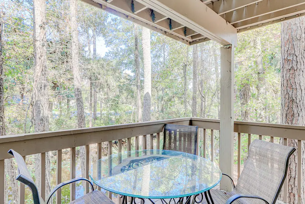 Dog-friendly condo with pool, central AC, & washer/dryer - quick walk to beach