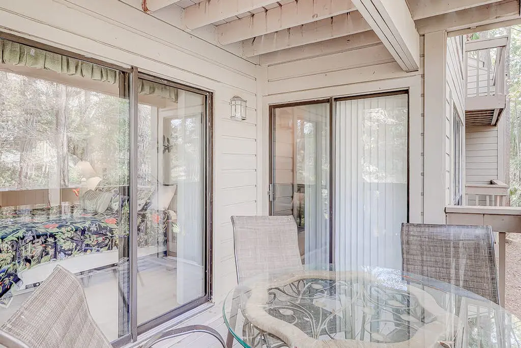 Dog-friendly condo with pool, central AC, & washer/dryer - quick walk to beach