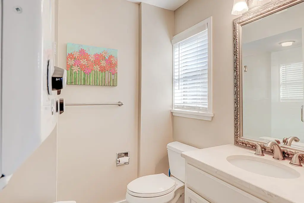 Dog-friendly condo with pool, central AC, & washer/dryer - quick walk to beach