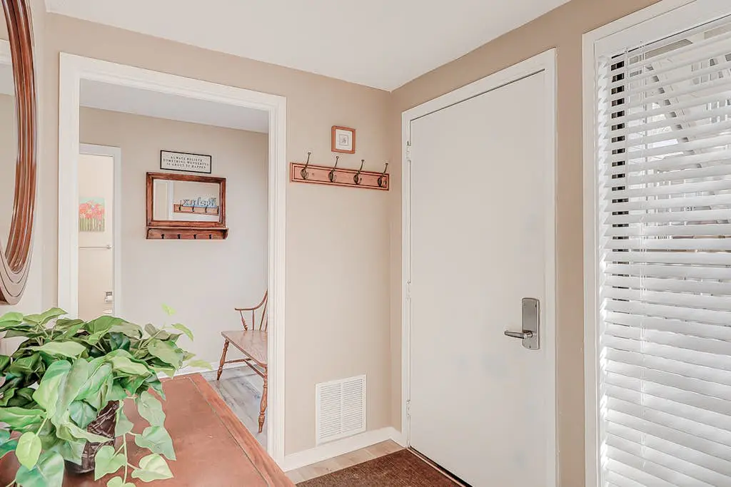 Dog-friendly condo with pool, central AC, & washer/dryer - quick walk to beach