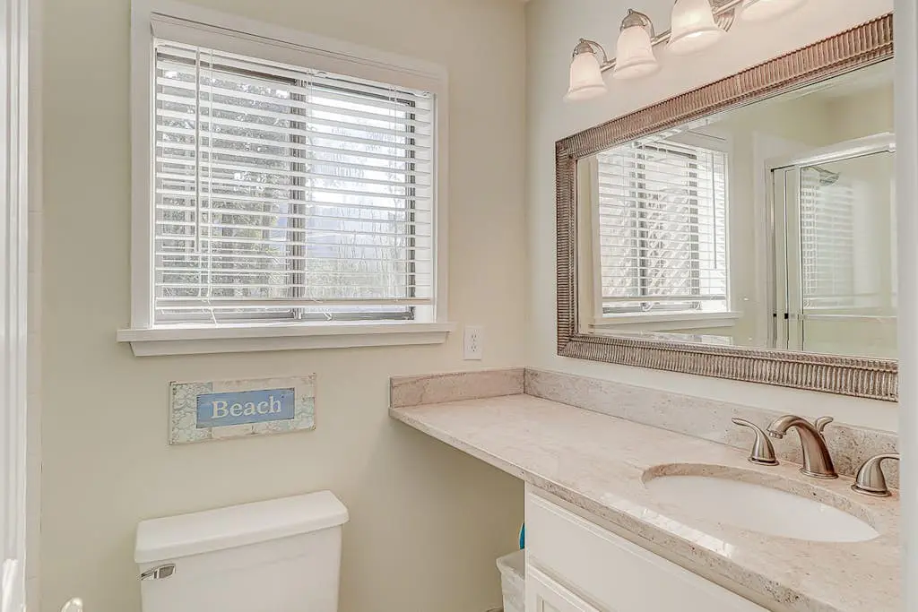 Dog-friendly condo with pool, central AC, & washer/dryer - quick walk to beach