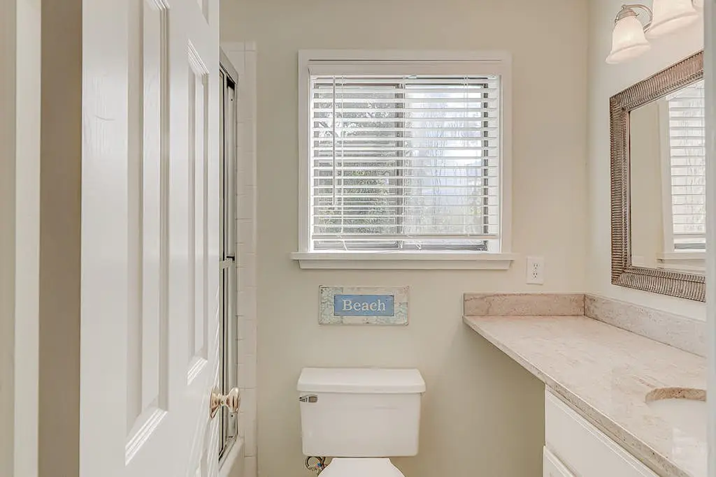 Dog-friendly condo with pool, central AC, & washer/dryer - quick walk to beach