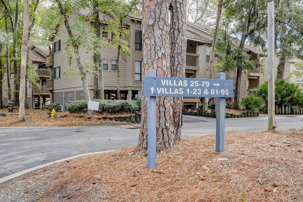 Dog-friendly condo with pool, central AC, & washer/dryer - quick walk to beach