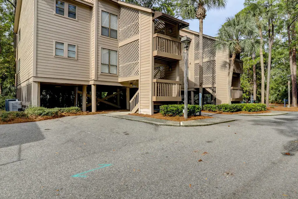 Dog-friendly condo with pool, central AC, & washer/dryer - quick walk to beach