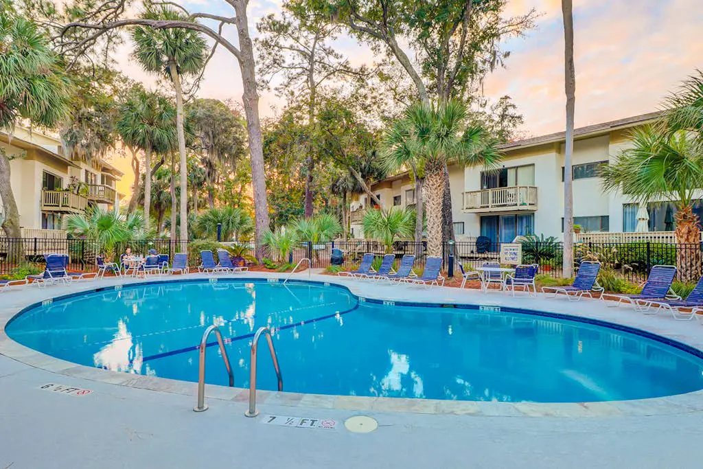 Beach access condo with deck, pool, washer/dryer, and AC - snowbird-friendly