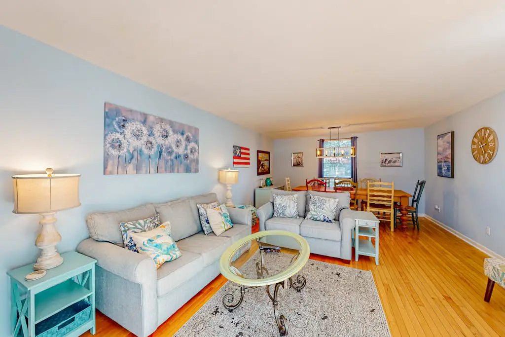 Beach access condo with deck, pool, washer/dryer, and AC - snowbird-friendly