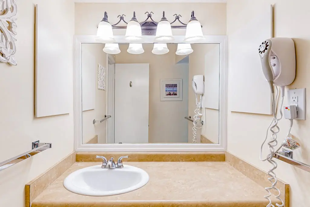 Beach access condo with deck, pool, washer/dryer, and AC - snowbird-friendly