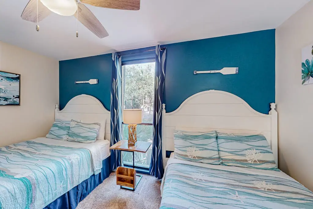 Beach access condo with deck, pool, washer/dryer, and AC - snowbird-friendly