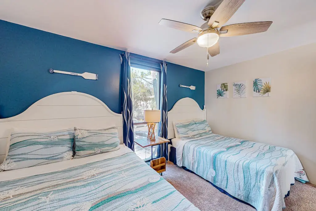 Beach access condo with deck, pool, washer/dryer, and AC - snowbird-friendly