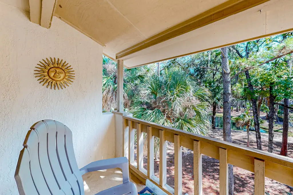 Beach access condo with deck, pool, washer/dryer, and AC - snowbird-friendly