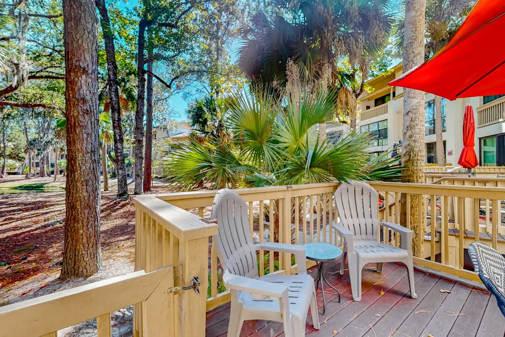 Beach access condo with deck, pool, washer/dryer, and AC - snowbird-friendly