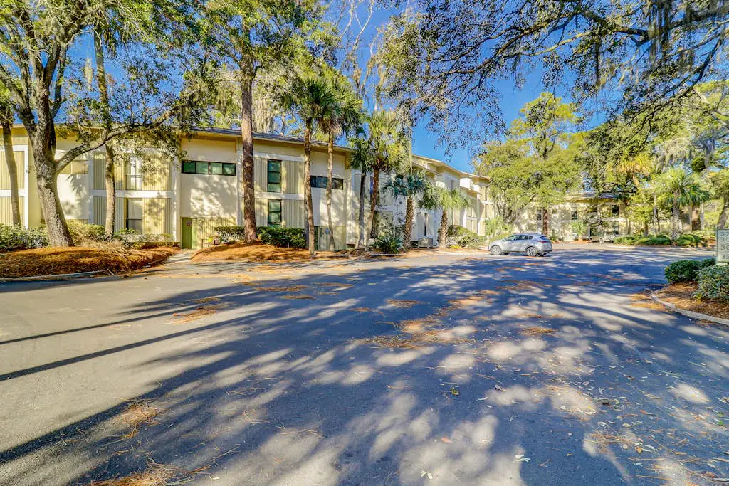 Beach access condo with deck, pool, washer/dryer, and AC - snowbird-friendly