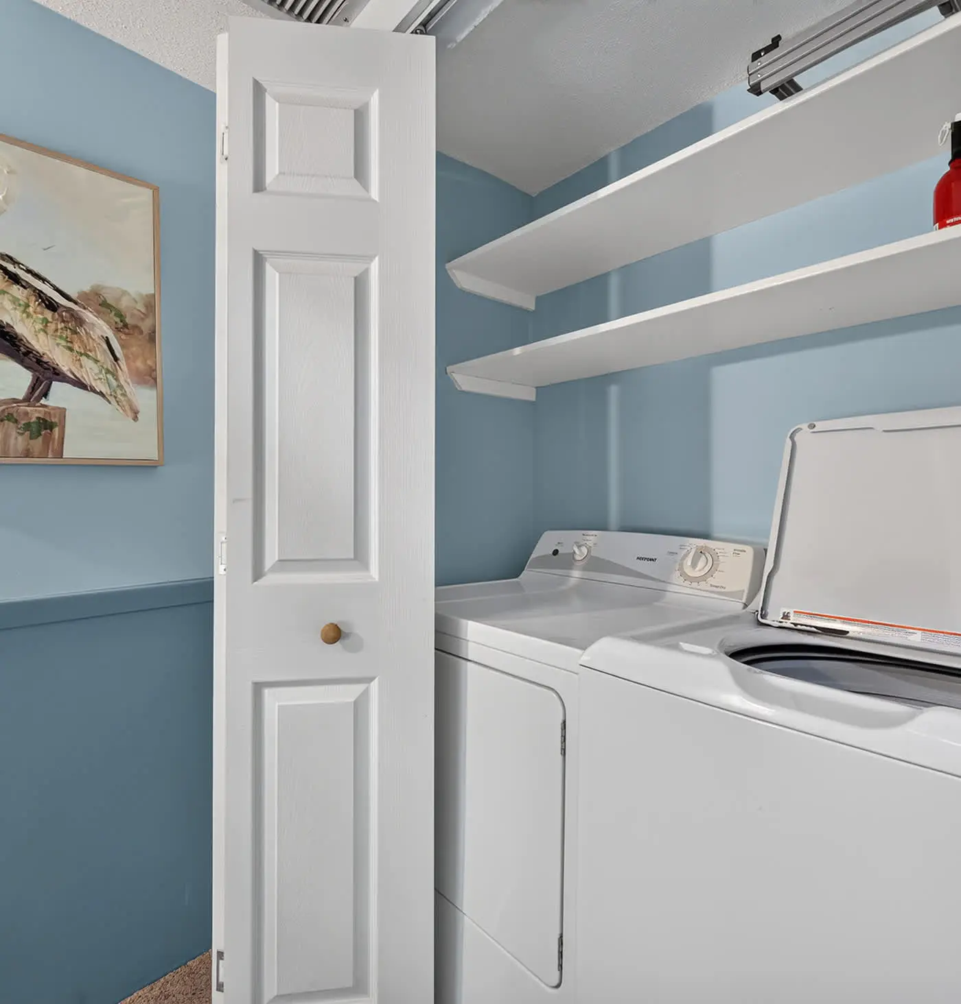 Beach access condo with deck, pool, washer dryer, and AC - snowbird-friendly