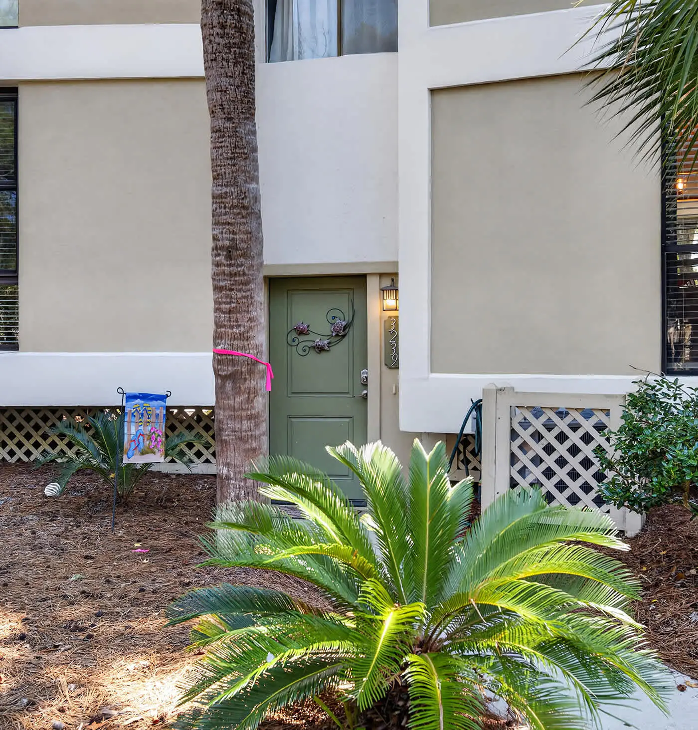 Beach access condo with deck, pool, washer dryer, and AC - snowbird-friendly
