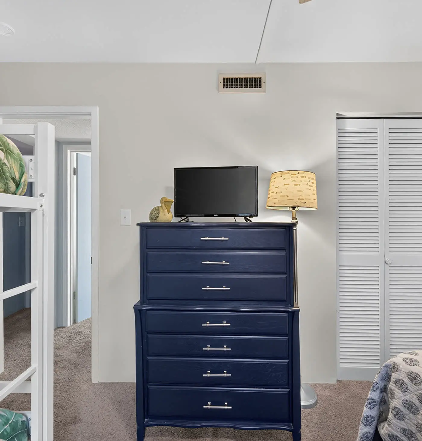Beach access condo with deck, pool, washer dryer, and AC - snowbird-friendly