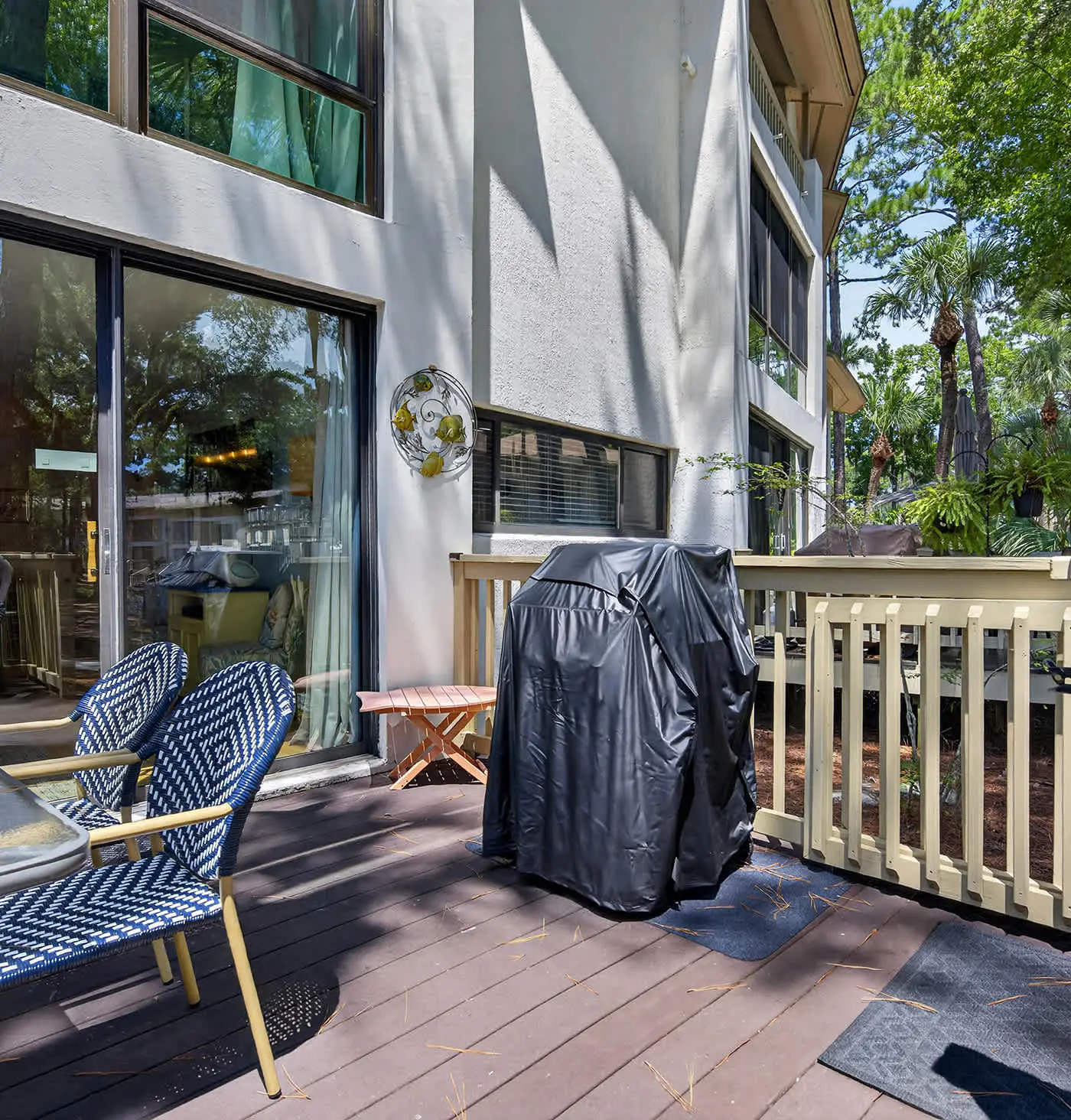 Beach access condo with deck, pool, washer dryer, and AC - snowbird-friendly