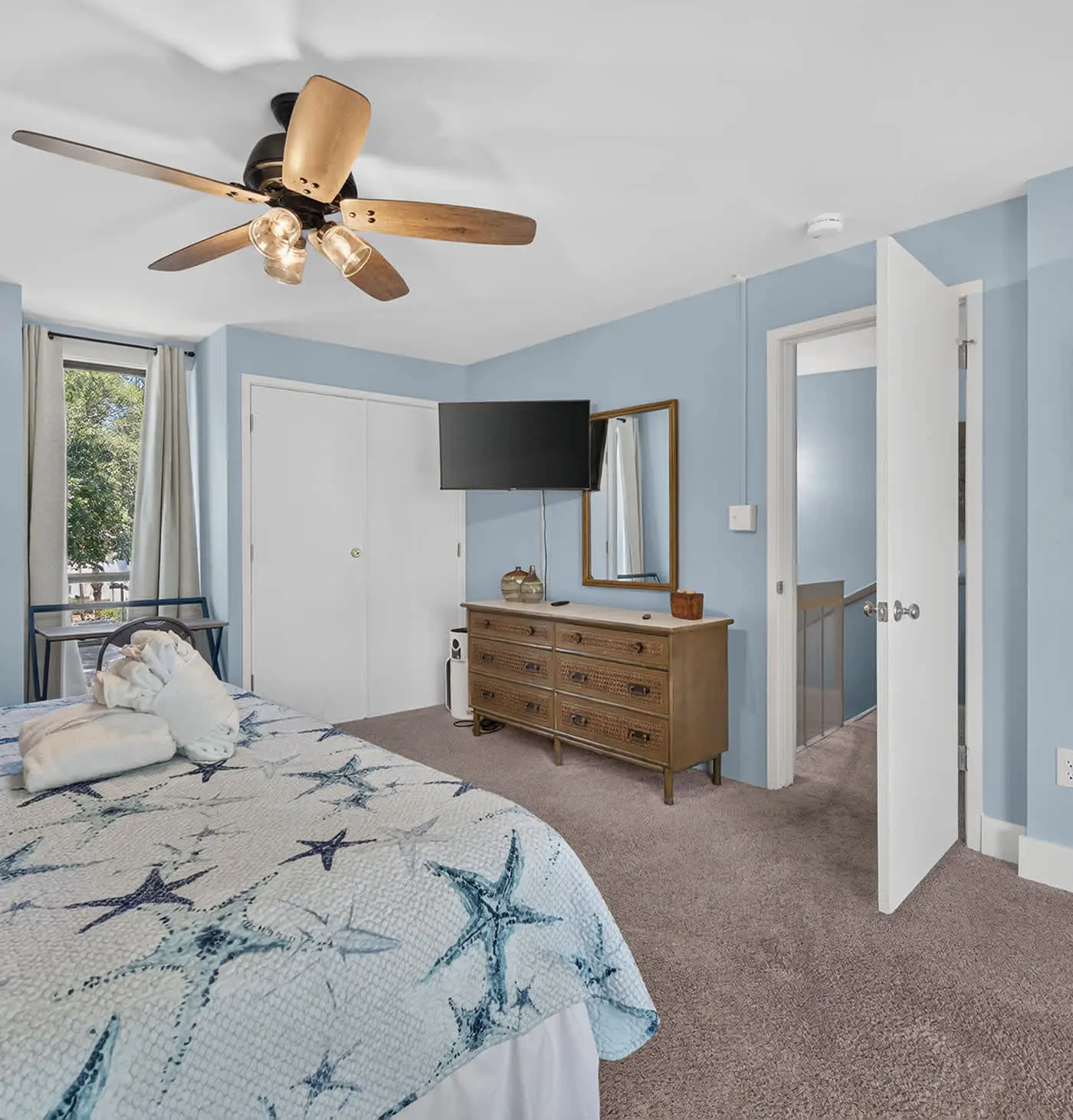 Beach access condo with deck, pool, washer dryer, and AC - snowbird-friendly