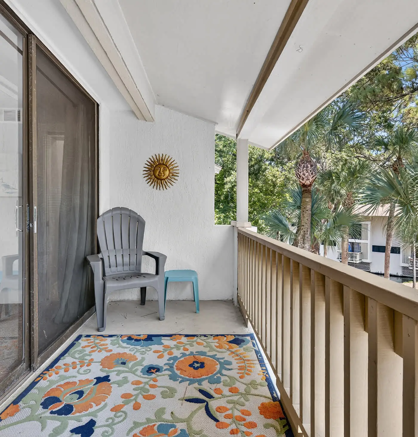 Beach access condo with deck, pool, washer dryer, and AC - snowbird-friendly