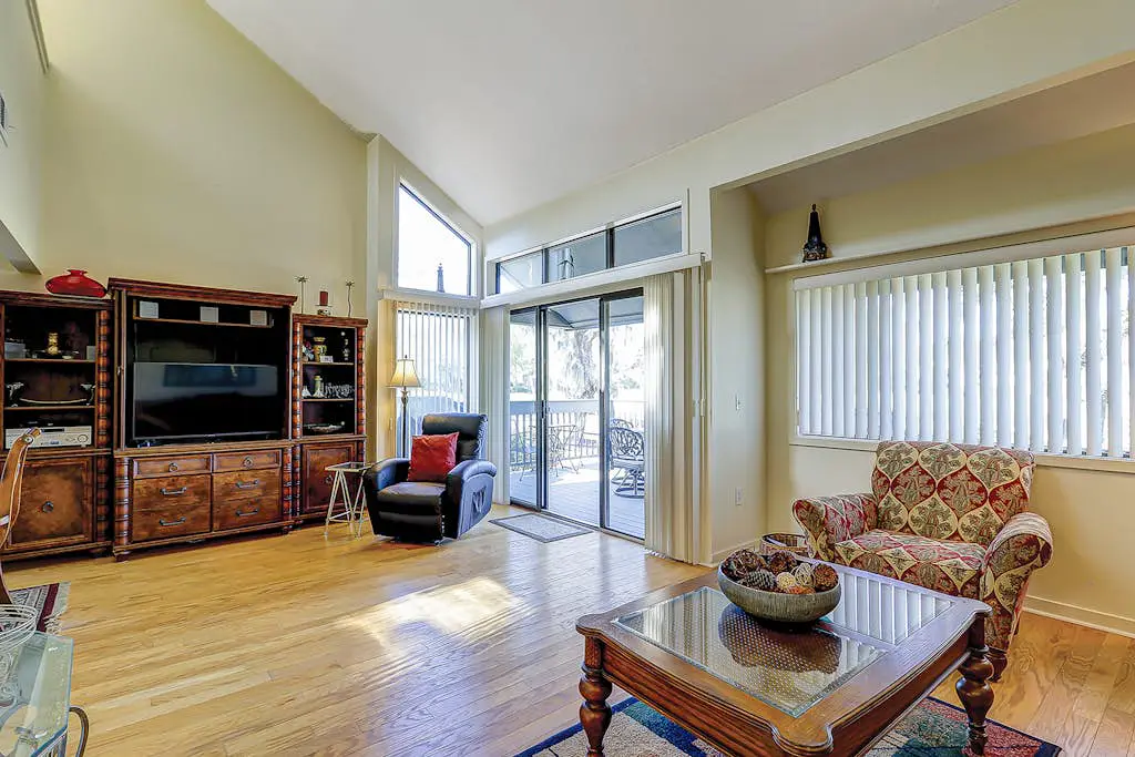Golf course-view condo near beach with pool & private deck - dog-friendly