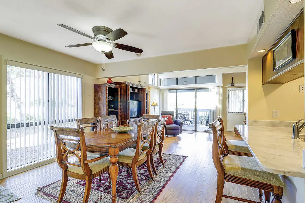 Golf course-view condo near beach with pool & private deck - dog-friendly