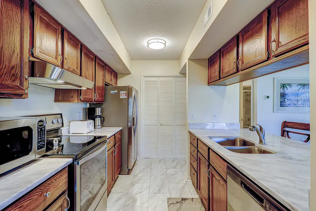 Golf course-view condo near beach with pool & private deck - dog-friendly
