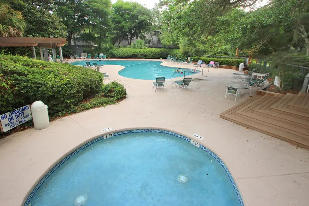 Golf course-view condo near beach with pool & private deck - dog-friendly