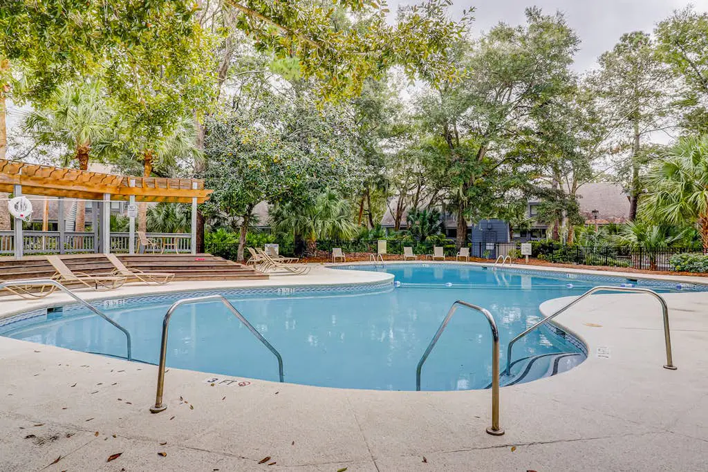 Golf course-view condo near beach with pool & private deck - dog-friendly