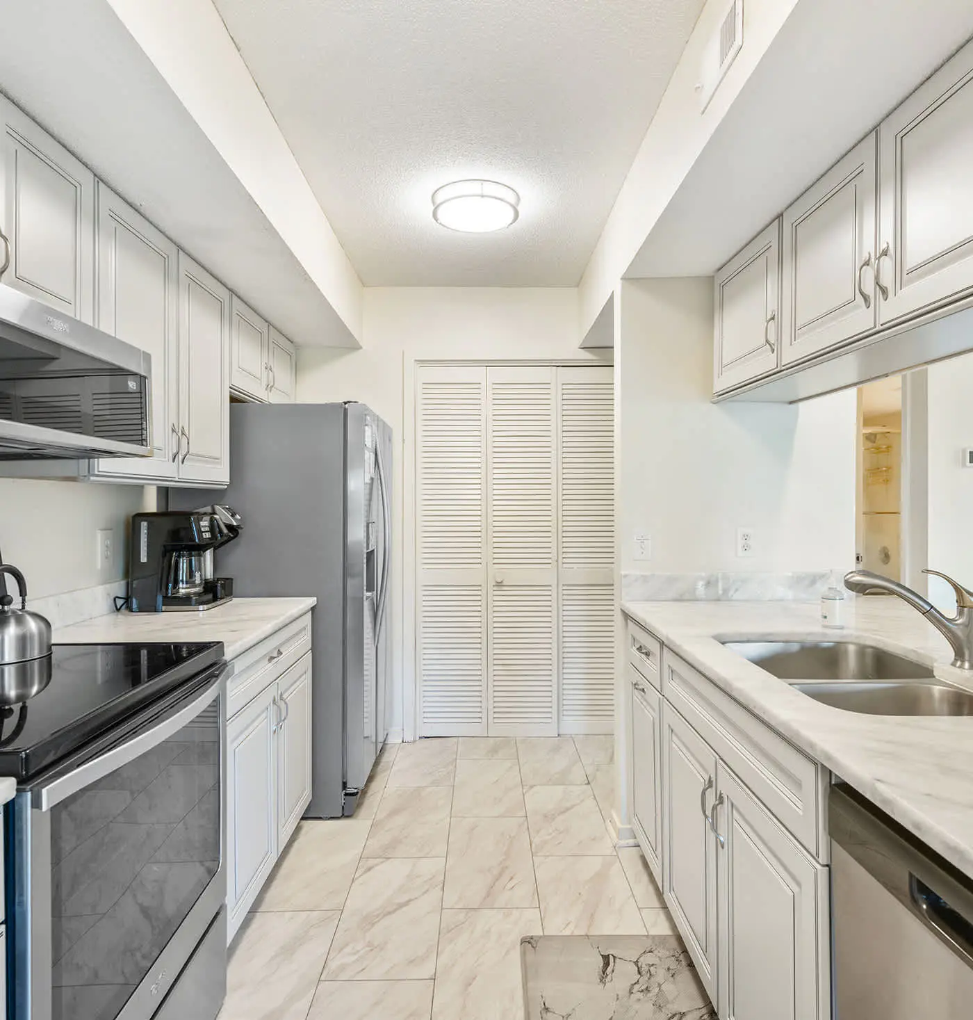 Golf course-view condo near beach with pool & private deck - dog-friendly