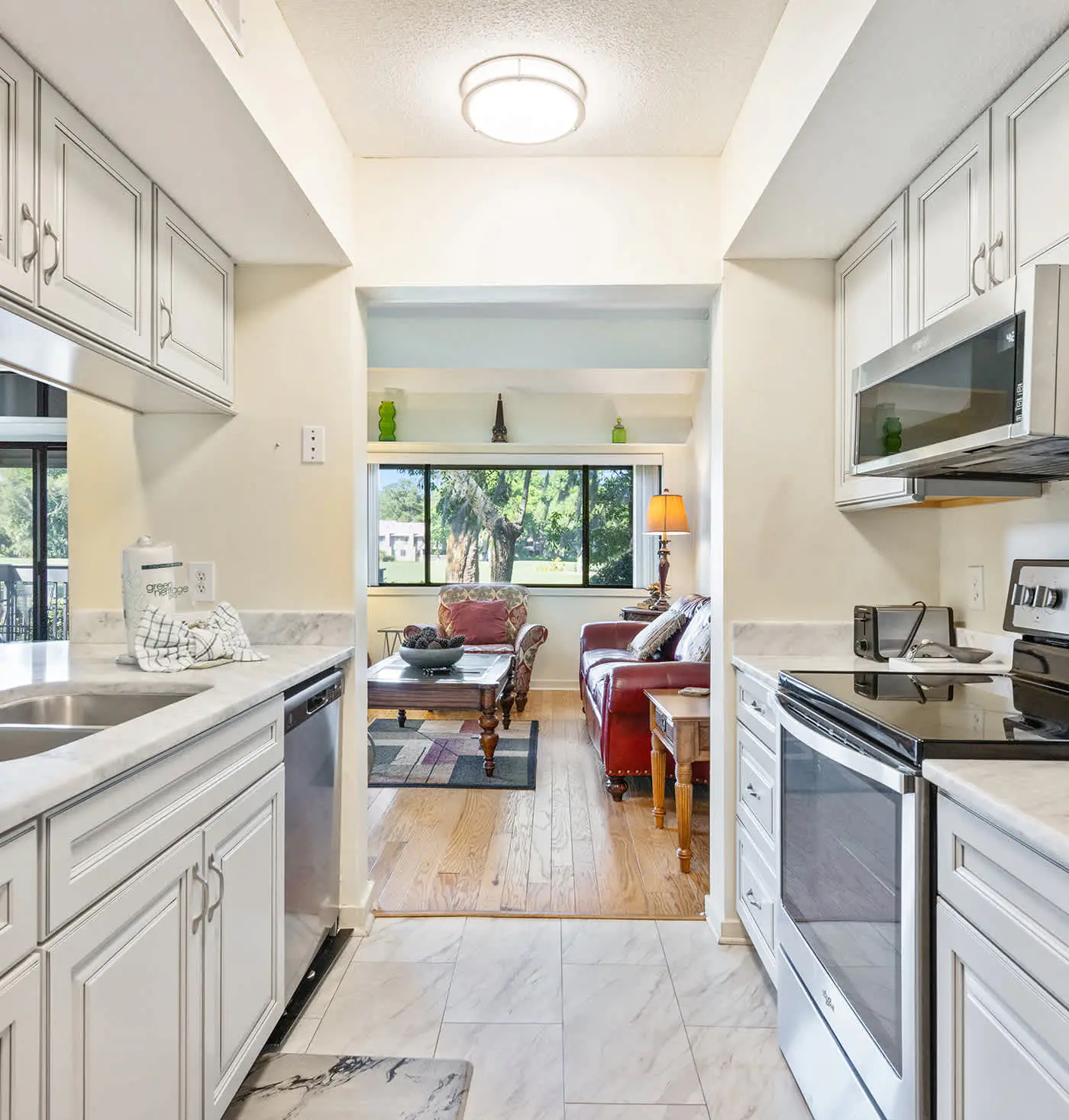 Golf course-view condo near beach with pool & private deck - dog-friendly