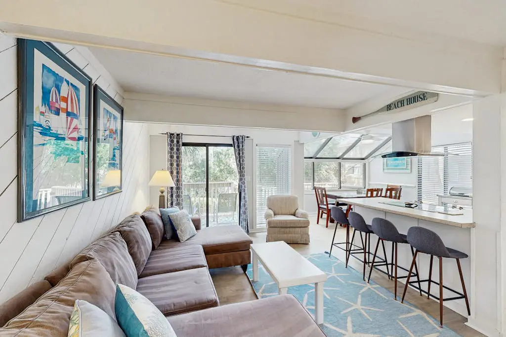 Sunny Villa with Spacious Decks, Al Fresco Dining, & Shared Pool - Nearby Beach Access