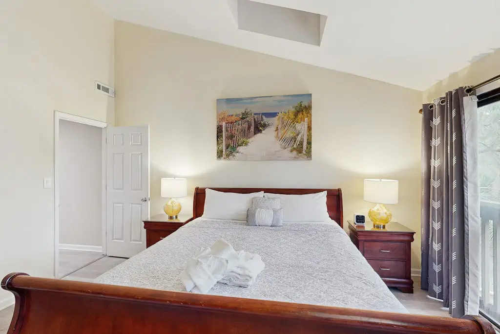 Sunny Villa with Spacious Decks, Al Fresco Dining, & Shared Pool - Nearby Beach Access