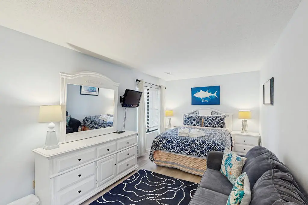 Sunny Villa with Spacious Decks, Al Fresco Dining, & Shared Pool - Nearby Beach Access