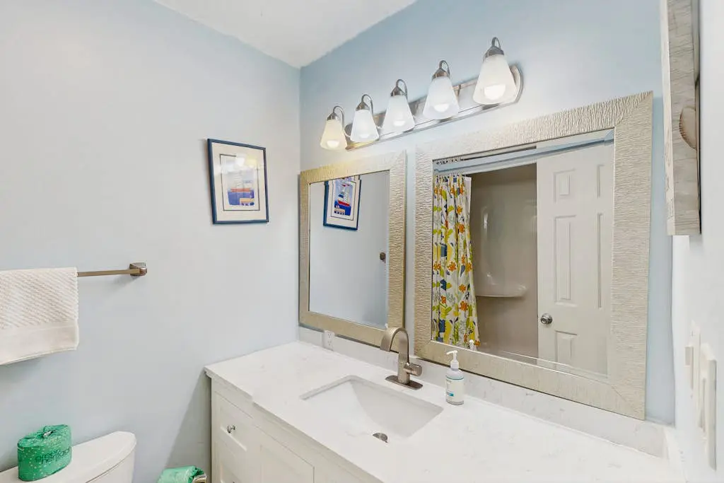 Sunny Villa with Spacious Decks, Al Fresco Dining, & Shared Pool - Nearby Beach Access