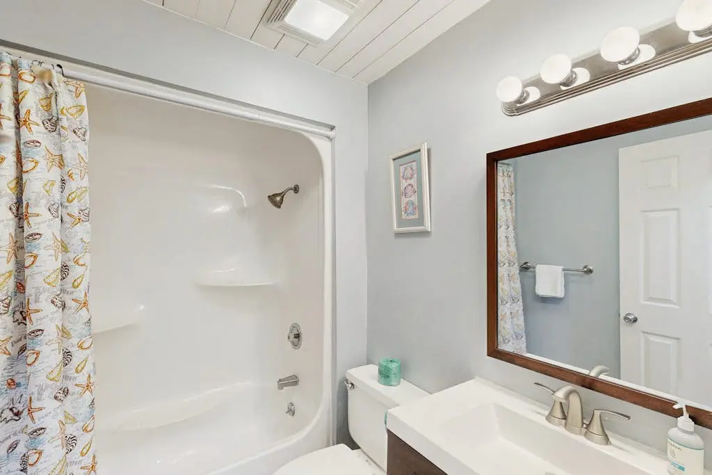 Sunny Villa with Spacious Decks, Al Fresco Dining, & Shared Pool - Nearby Beach Access