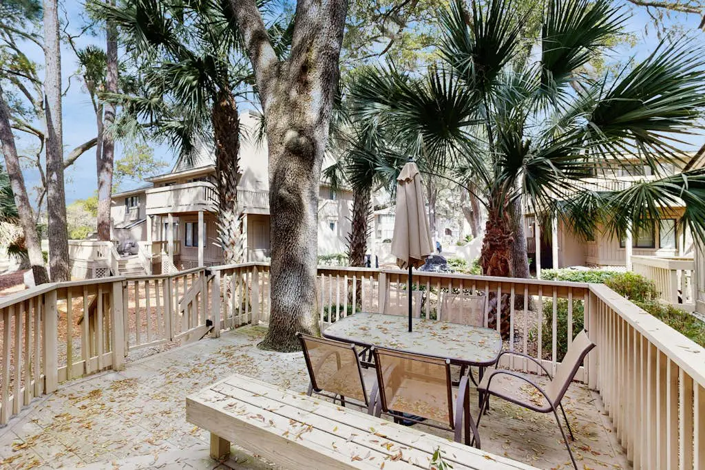 Sunny Villa with Spacious Decks, Al Fresco Dining, & Shared Pool - Nearby Beach Access