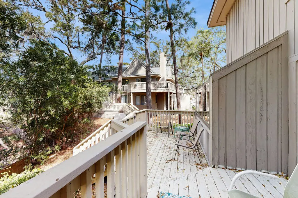 Sunny Villa with Spacious Decks, Al Fresco Dining, & Shared Pool - Nearby Beach Access