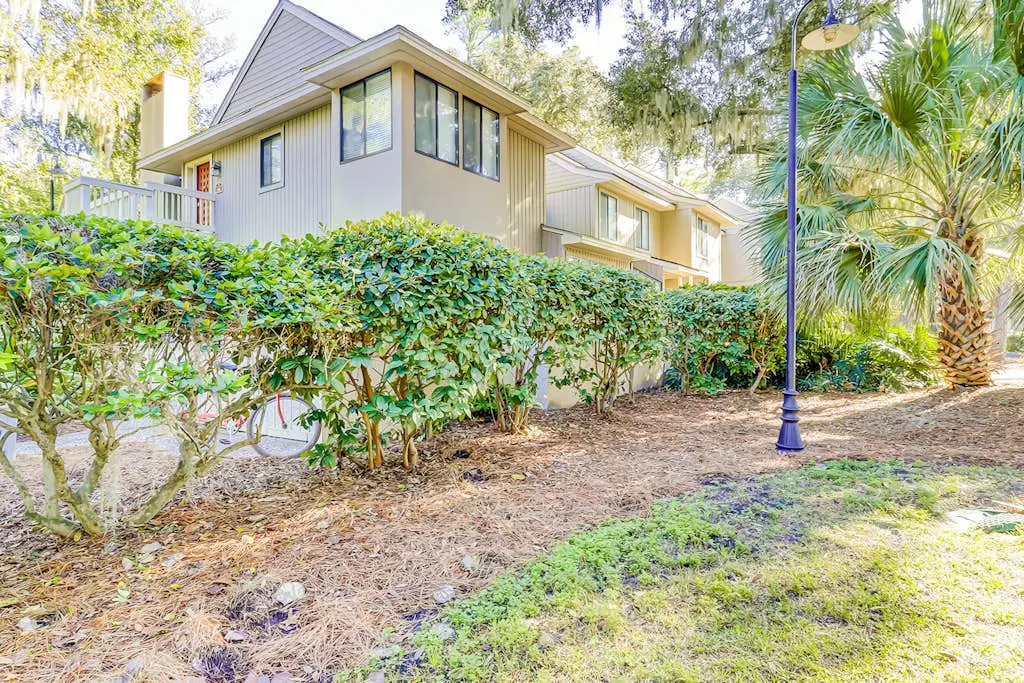 Sunny Villa with Spacious Decks, Al Fresco Dining, & Shared Pool - Nearby Beach Access