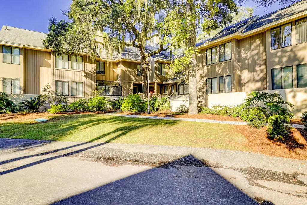 Sunny Villa with Spacious Decks, Al Fresco Dining, & Shared Pool - Nearby Beach Access