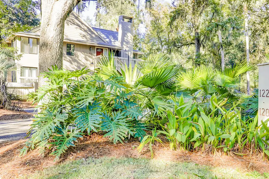 Sunny Villa with Spacious Decks, Al Fresco Dining, & Shared Pool - Nearby Beach Access