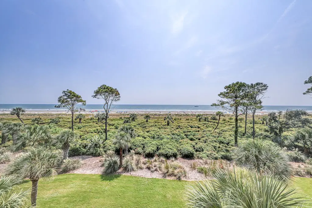 Updated beach gem with ocean views, pool, hot tub, & tennis - snowbird-friendly