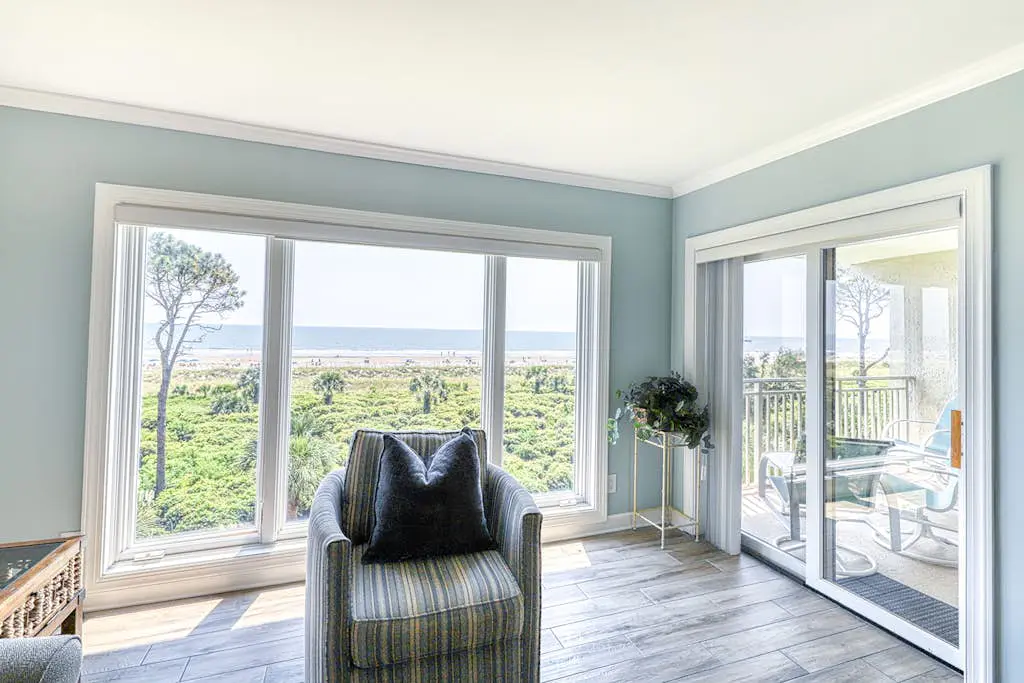 Updated beach gem with ocean views, pool, hot tub, & tennis - snowbird-friendly