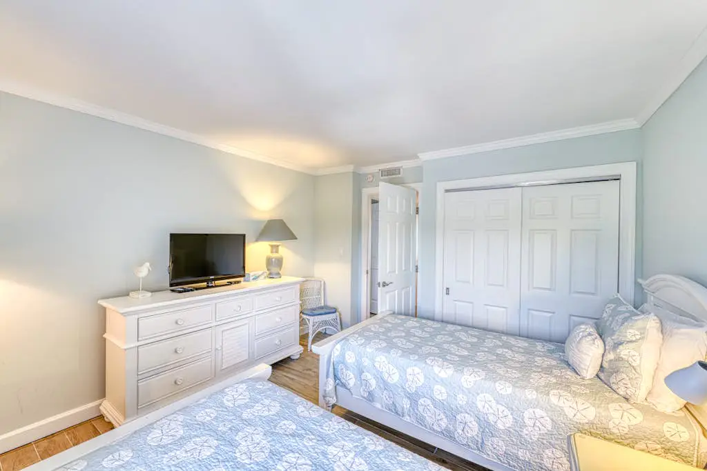 Updated beach gem with ocean views, pool, hot tub, & tennis - snowbird-friendly