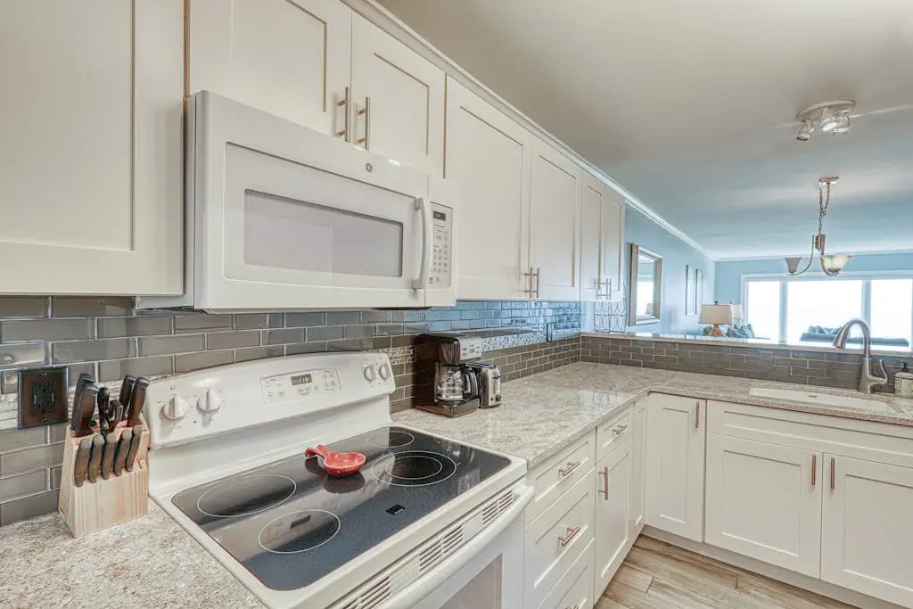 Updated beach gem with ocean views, pool, hot tub, & tennis - snowbird-friendly