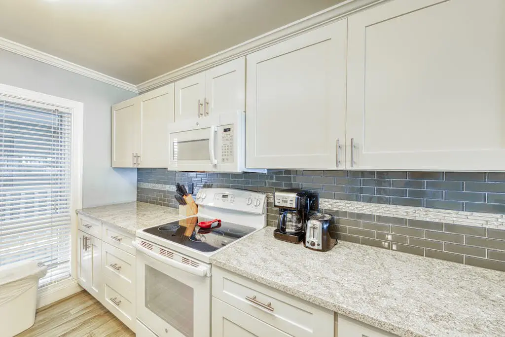Updated beach gem with ocean views, pool, hot tub, & tennis - snowbird-friendly