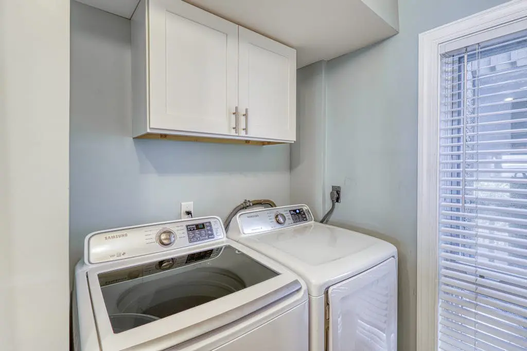 Updated beach gem with ocean views, pool, hot tub, & tennis - snowbird-friendly