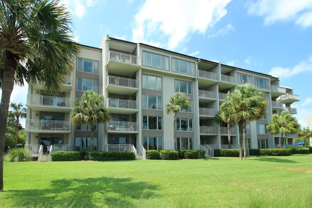 Updated beach gem with ocean views, pool, hot tub, & tennis - snowbird-friendly