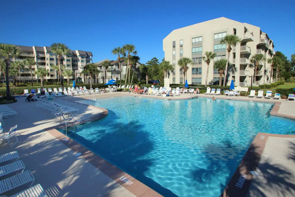 Updated beach gem with ocean views, pool, hot tub, & tennis - snowbird-friendly