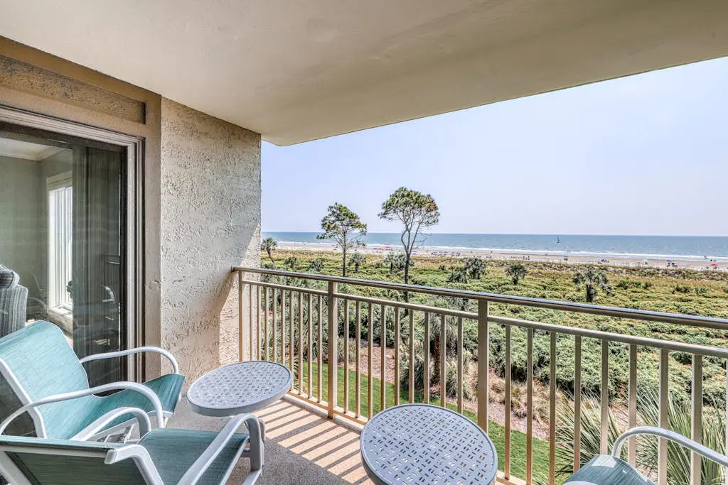 Updated beach gem with ocean views, pool, hot tub, & tennis - snowbird-friendly