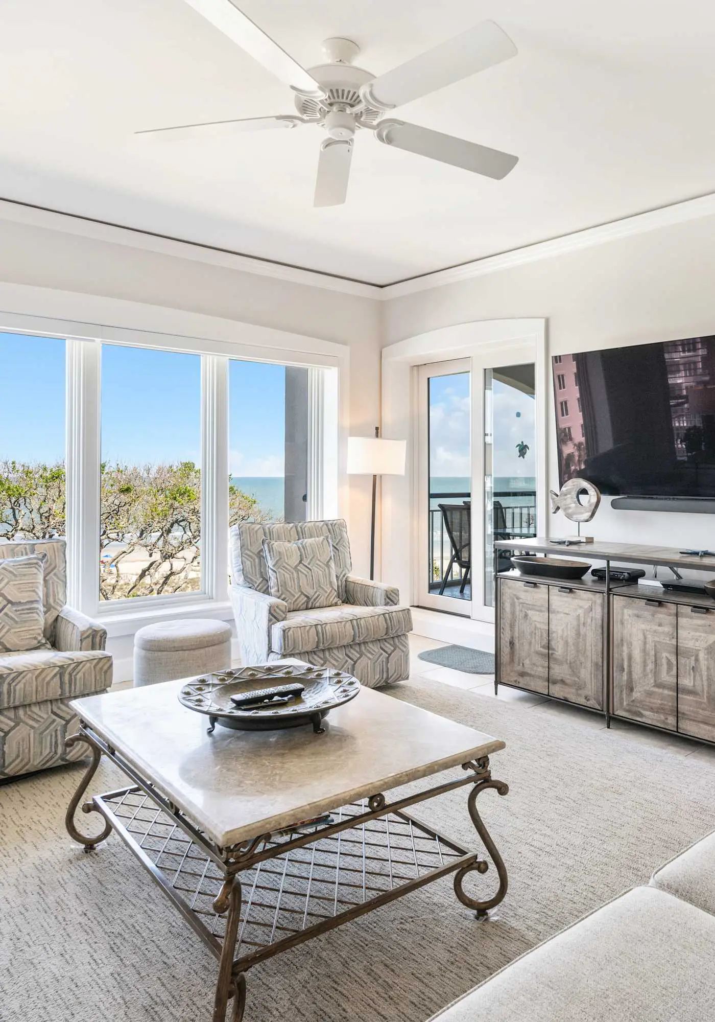 Stunning beach condo with two ocean-view balconies, shared pool & hot tub