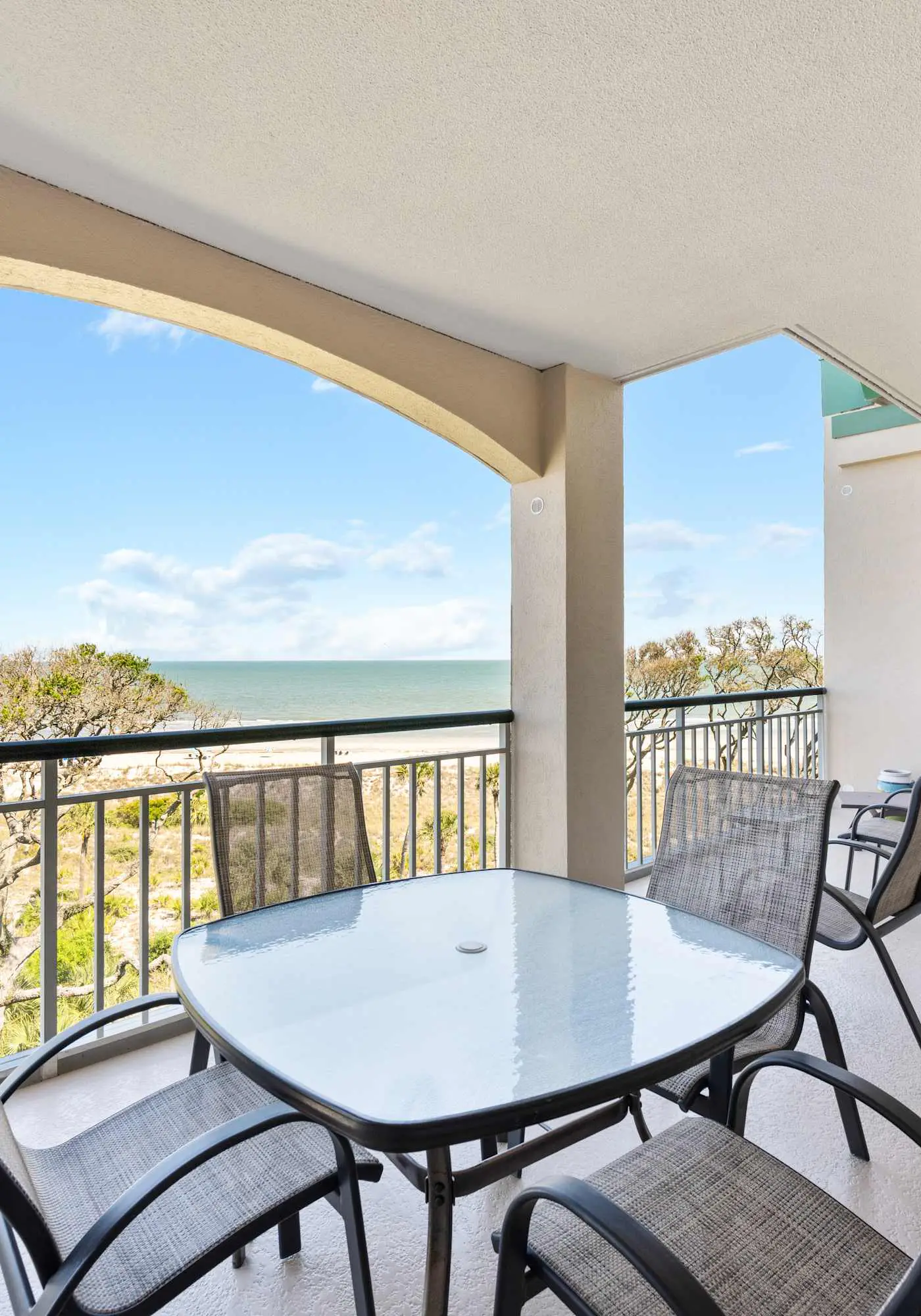 Stunning beach condo with two ocean-view balconies, shared pool & hot tub